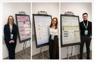 Autorzy przy plakatach podczas konferencji